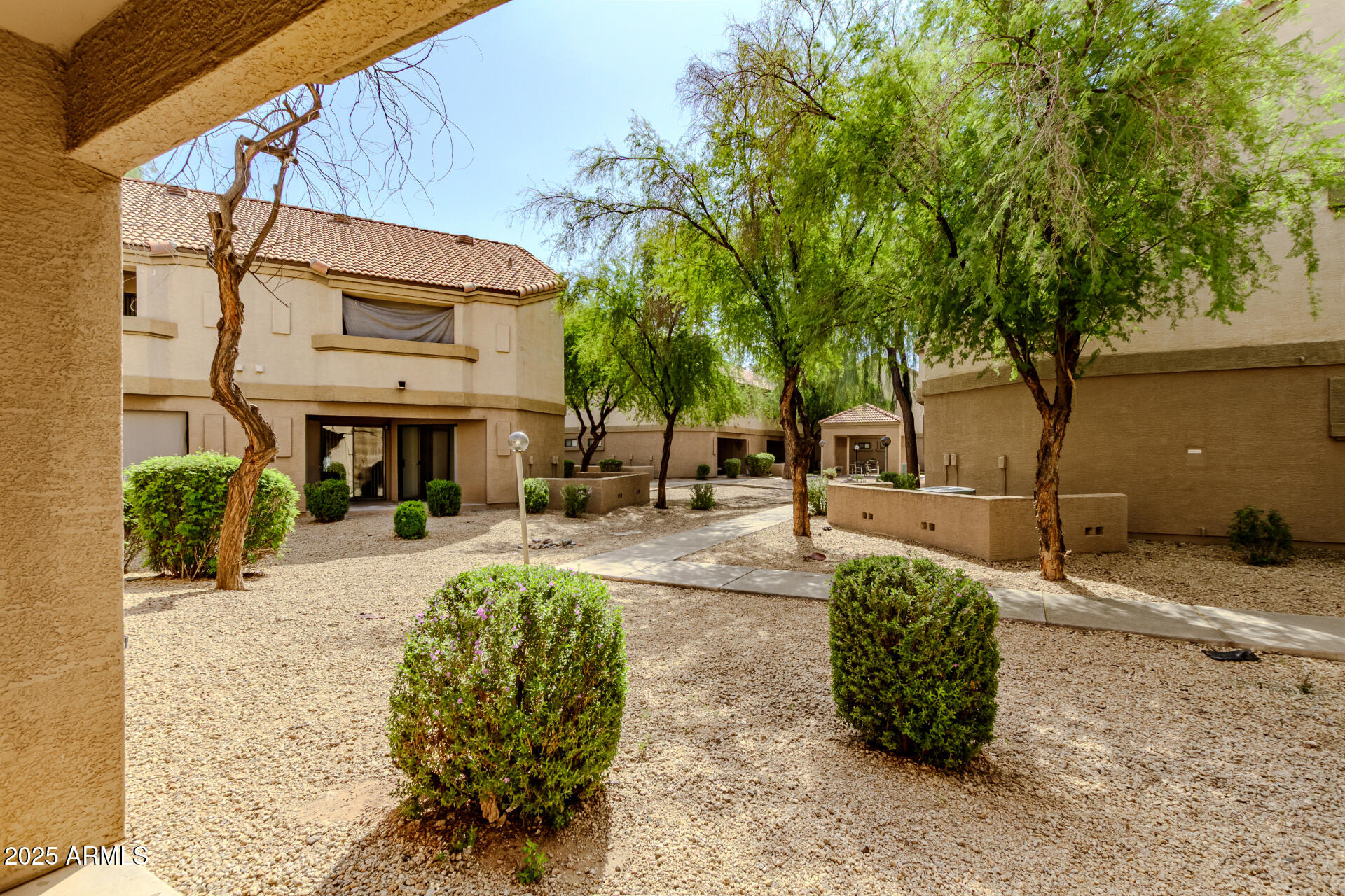 1287 North Alma School Road, Unit 156 Chandler, AZ 85224 - Photo 19 of 34 a view of a house with backyard and sitting area