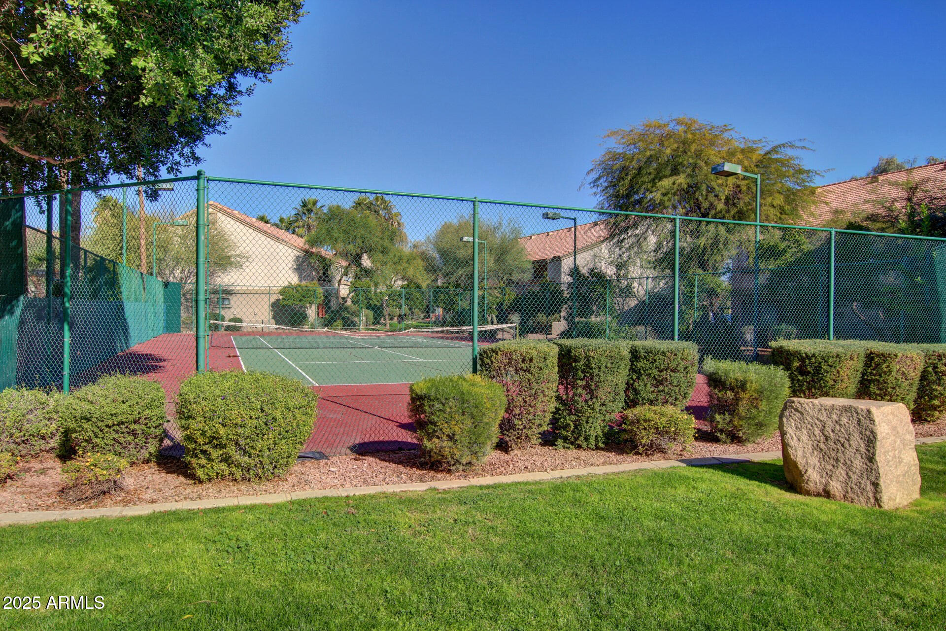 1287 North Alma School Road, Unit 156 Chandler, AZ 85224 - Photo 30 of 34 a view of garden with tall trees