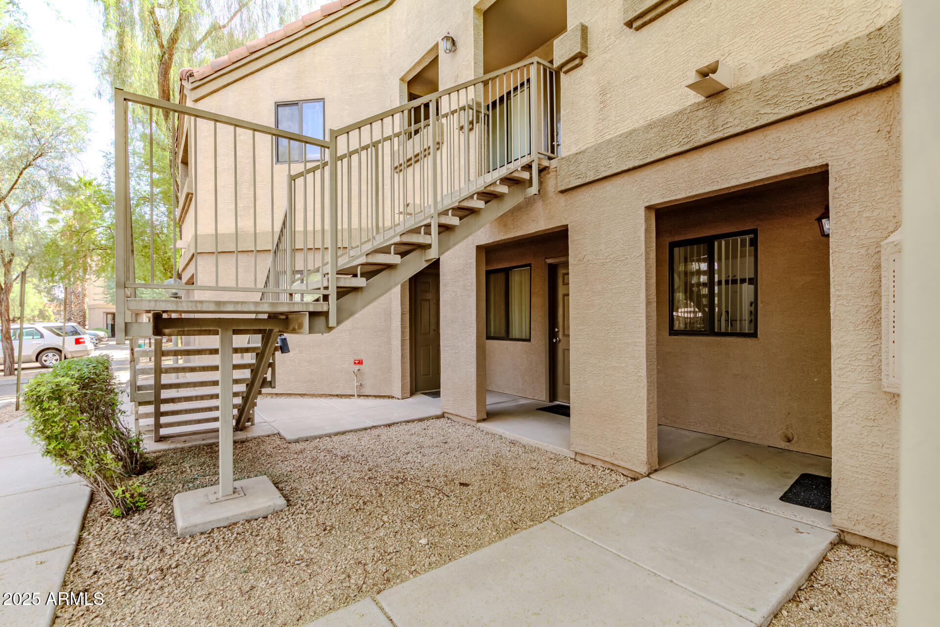 1287 North Alma School Road, Unit 156 Chandler, AZ 85224 - Photo 33 of 34 a view of entryway with a front door