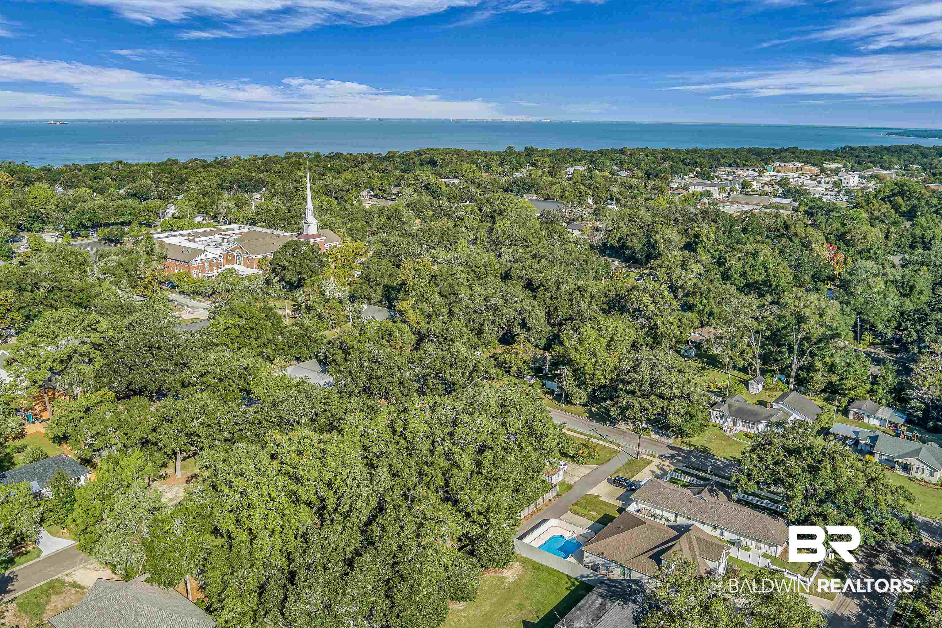 357 Azalea Street Fairhope, AL 36532 - Photo 21 of 22 Aerial view of property and surrounding area with a nearby body of water and nearby suburban area