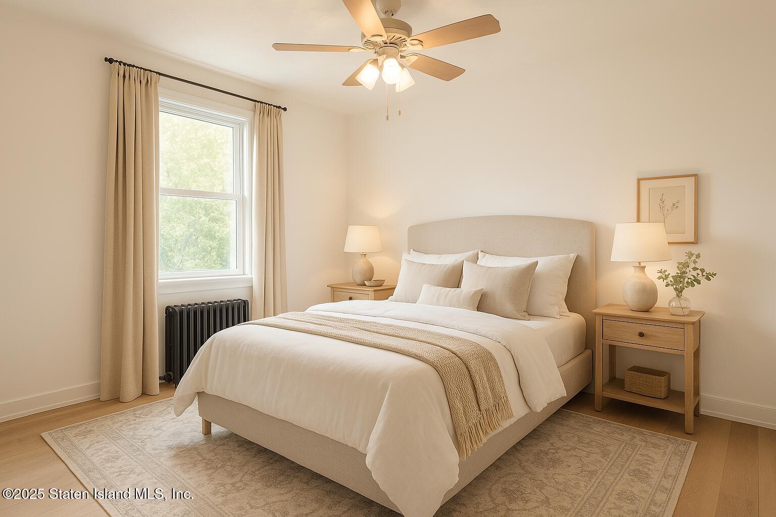 186 Raritan Avenue Staten Island, NY 10304 - Photo 23 of 51 a bedroom with a bed and a window