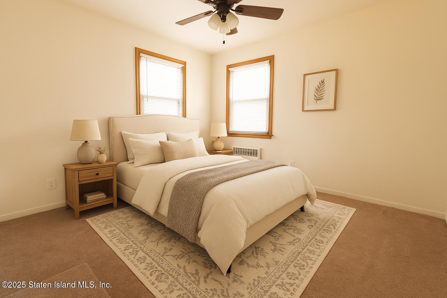 186 Raritan Avenue Staten Island, NY 10304 - Photo 44 of 51 a bedroom with a bed and a ceiling fan