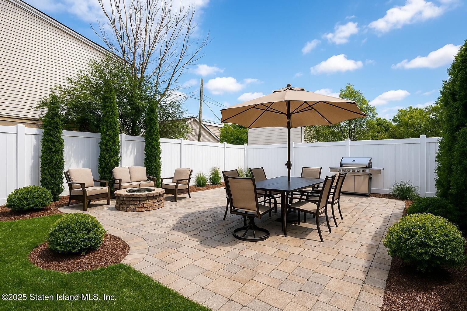 186 Raritan Avenue Staten Island, NY 10304 - Photo 48 of 51 a view of a tables and chairs under an umbrella