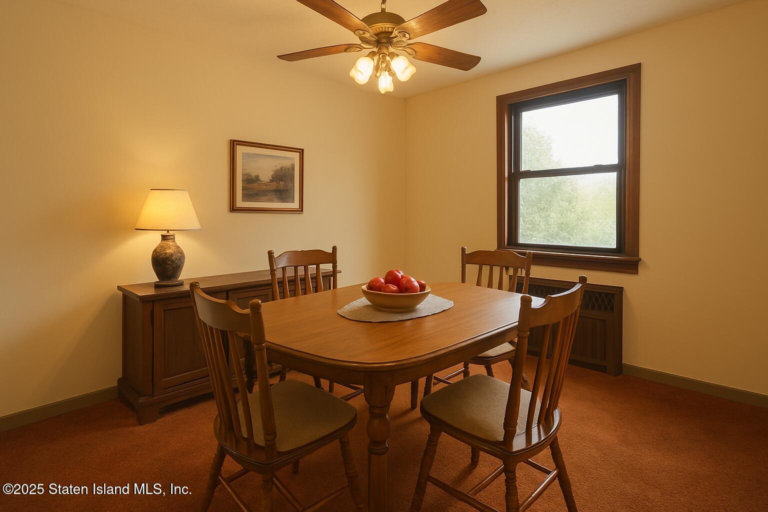186 Raritan Avenue Staten Island, NY 10304 - Photo 10 of 51 a view of a dining room with furniture and chandelier