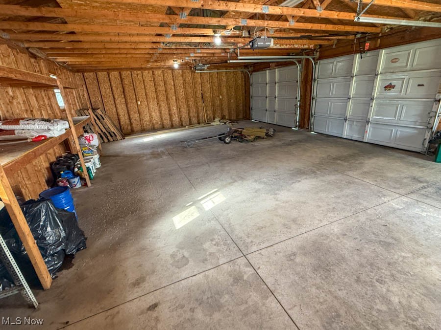 934 Dodgeville Road Rome, OH 44085 - Photo 14 of 14 Garage with a garage door opener