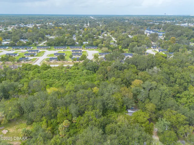 a view of a city with an ocean