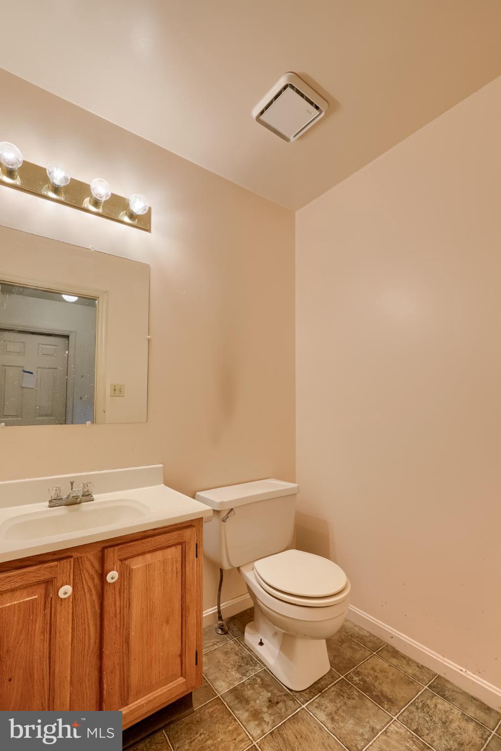 28 Brookview Drive Lititz, PA 17543 - Photo 25 of 31 a bathroom with a sink a toilet and mirror