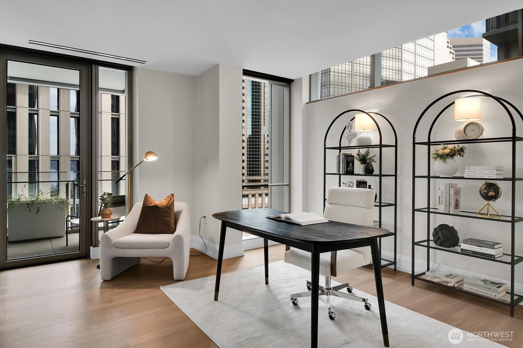 99 Union Street, Unit 1205 & 1206 Seattle, WA 98101 - Photo 21 of 40 a living room with furniture a rug and a table