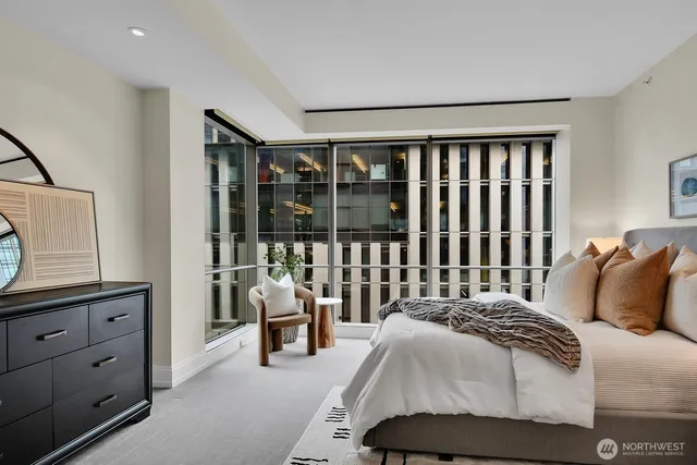 a bath tub sitting next to a white sink