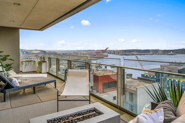 a view of a balcony with chairs