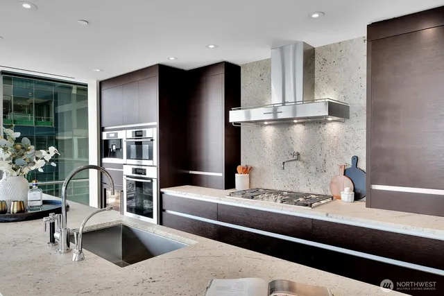 a living room with furniture and flowers