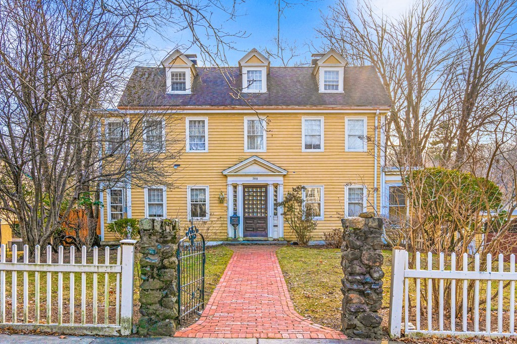 288 Mill Street Newton, MA 02460 - Photo 1 of 35 a front view of a house with a yard