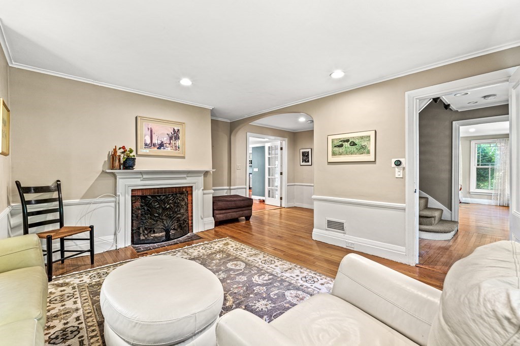 288 Mill Street Newton, MA 02460 - Photo 13 of 35 a living room with furniture and a fireplace