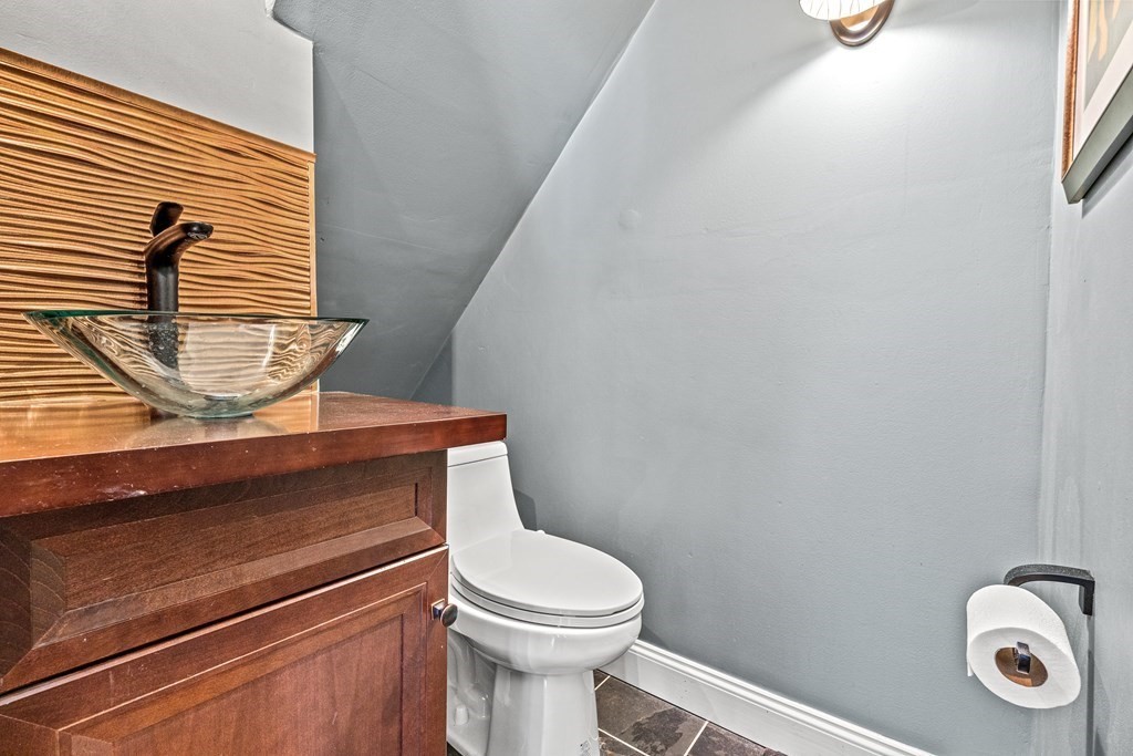 288 Mill Street Newton, MA 02460 - Photo 15 of 35 a bathroom with a toilet and a sink