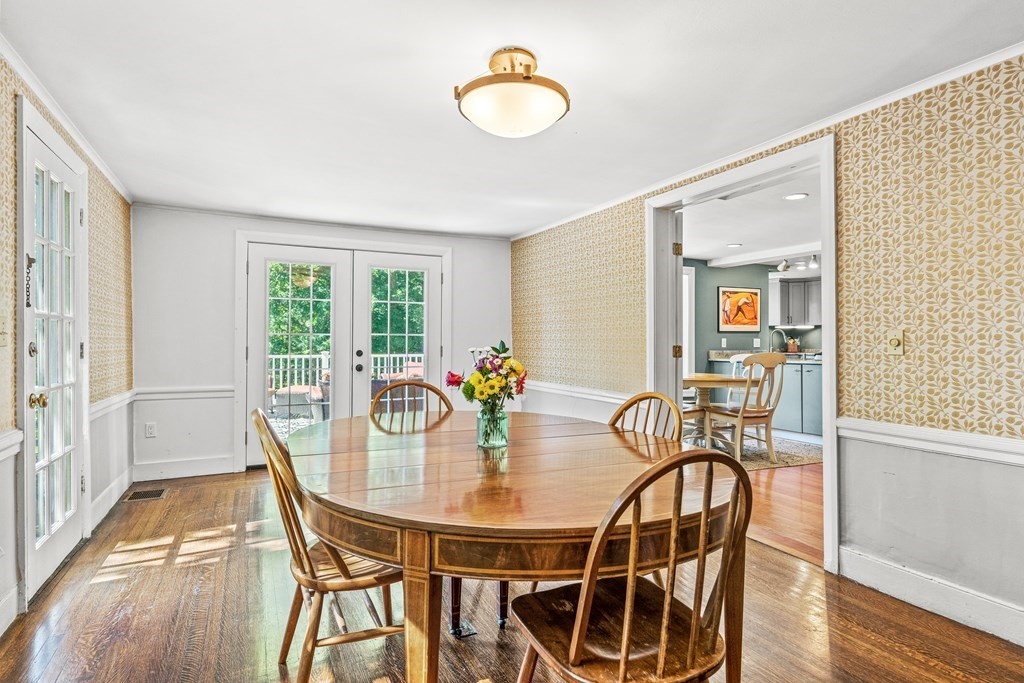 288 Mill Street Newton, MA 02460 - Photo 10 of 35 a view of a dining room with furniture and wooden floor