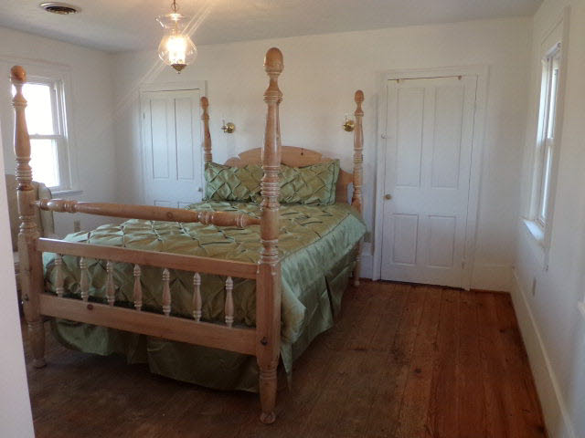10982 Back Road Maurertown, VA 22644 - Photo 19 of 35 a bedroom with a bed and a table
