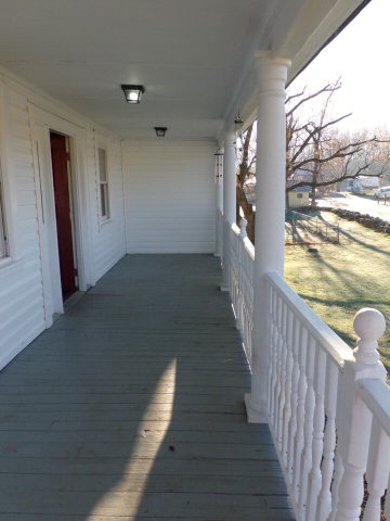 10982 Back Road Maurertown, VA 22644 - Photo 21 of 35 a view of a hallway with wooden floor and stairs
