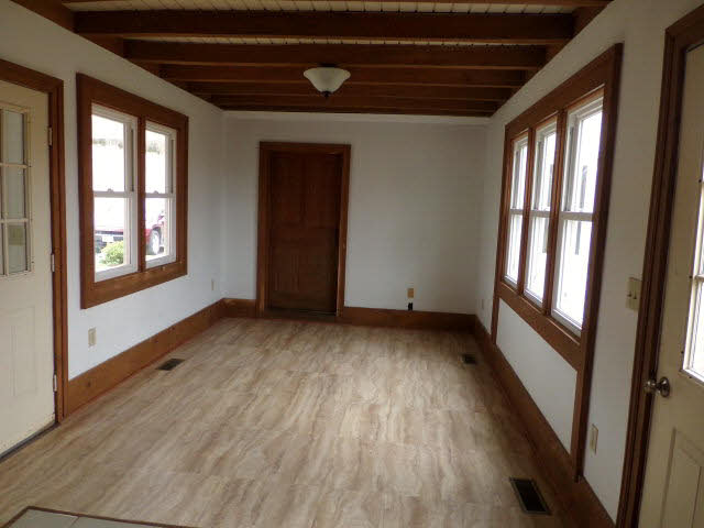 10982 Back Road Maurertown, VA 22644 - Photo 25 of 35 a view of an empty room with wooden floor and a window