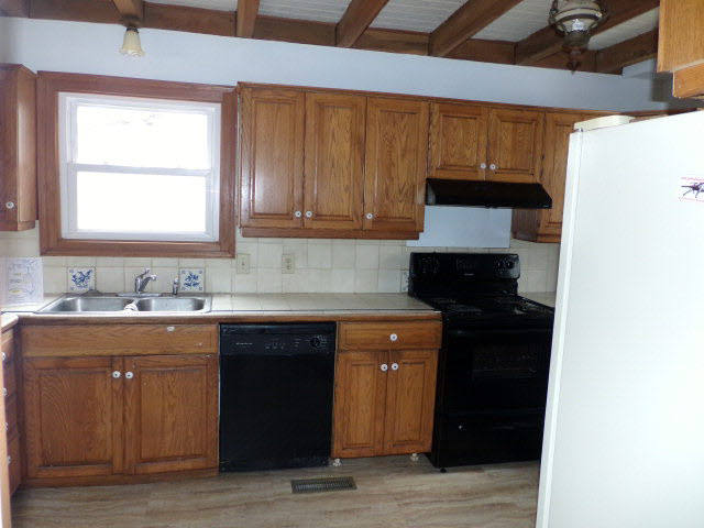 10982 Back Road Maurertown, VA 22644 - Photo 26 of 35 a kitchen with a sink and a window