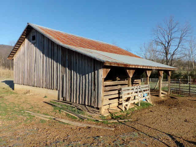 10982 Back Road Maurertown, VA 22644 - Photo 4 of 35 a front view of a house with garden