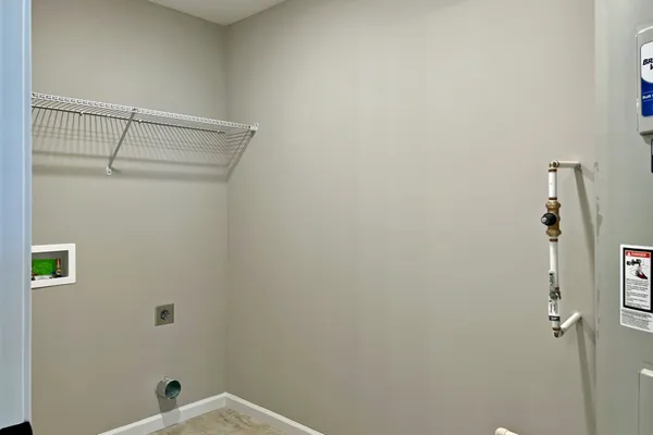 a bathroom with a shower and cabinets