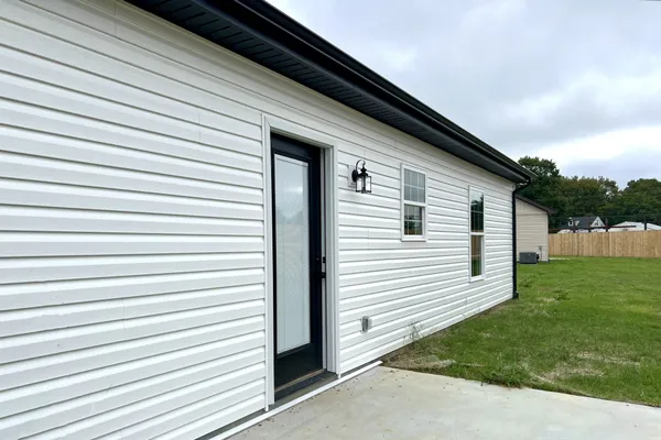 a view of a back yard of the house