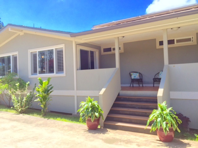 701 Kauhikoa Road Haiku, HI 96708 - Photo 2 of 27 a front view of a house with plants