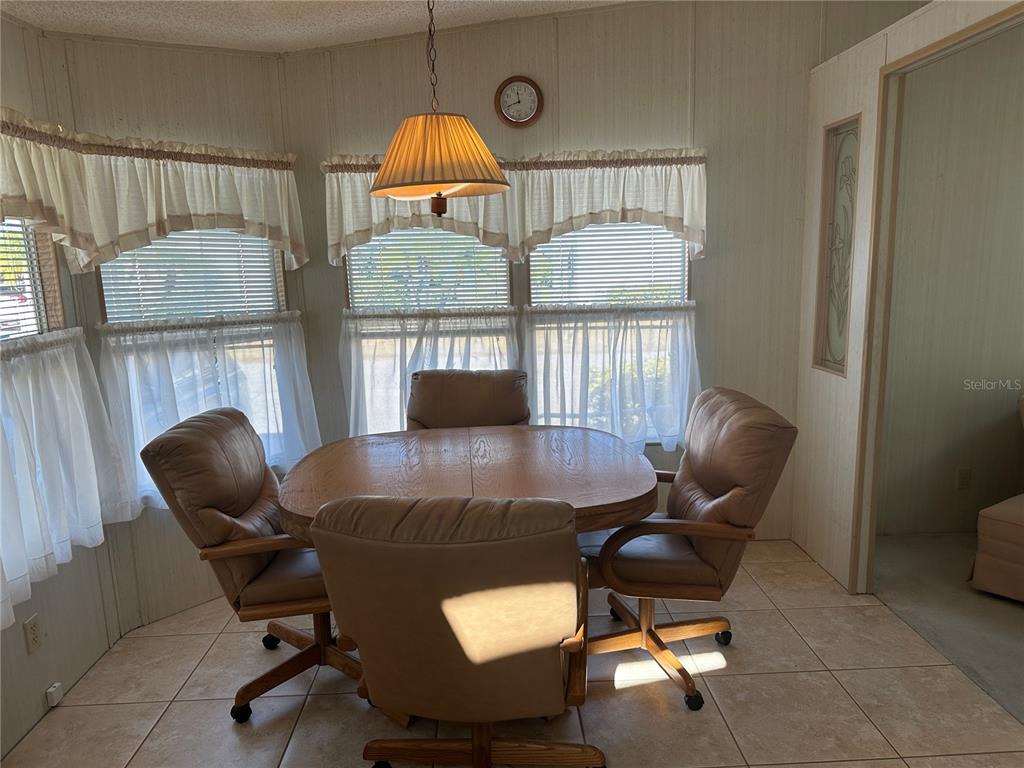 449 Landsedge Drive North Port, FL 34287 - Photo 4 of 12 a view of a livingroom with furniture and a window