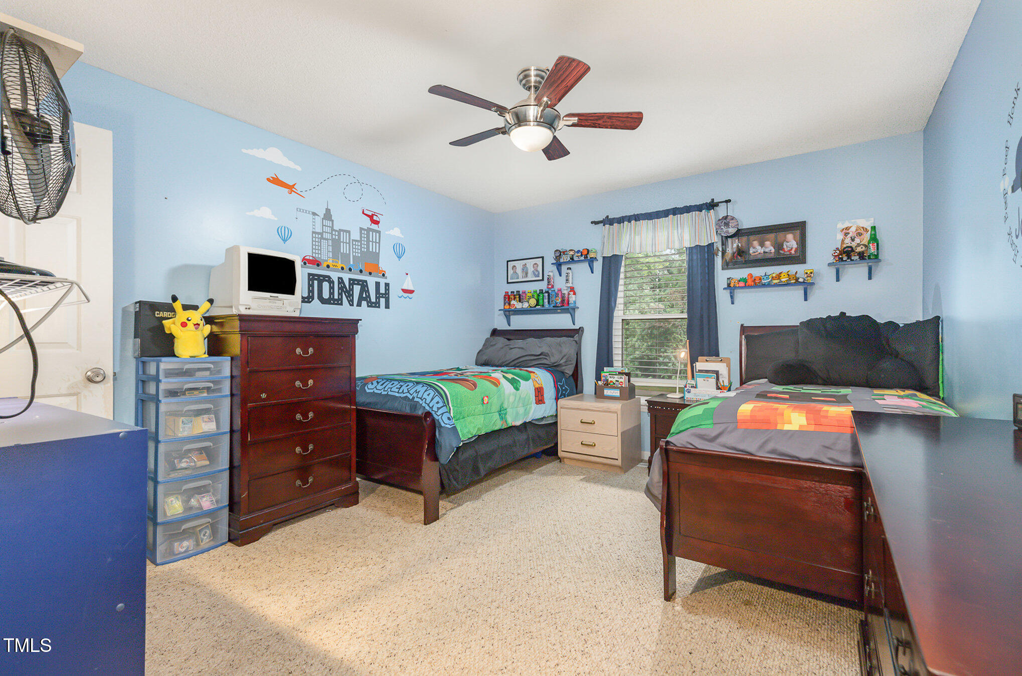 5840 Fayetteville Road Raleigh, NC 27603 - Photo 13 of 40 a bedroom with furniture and a window
