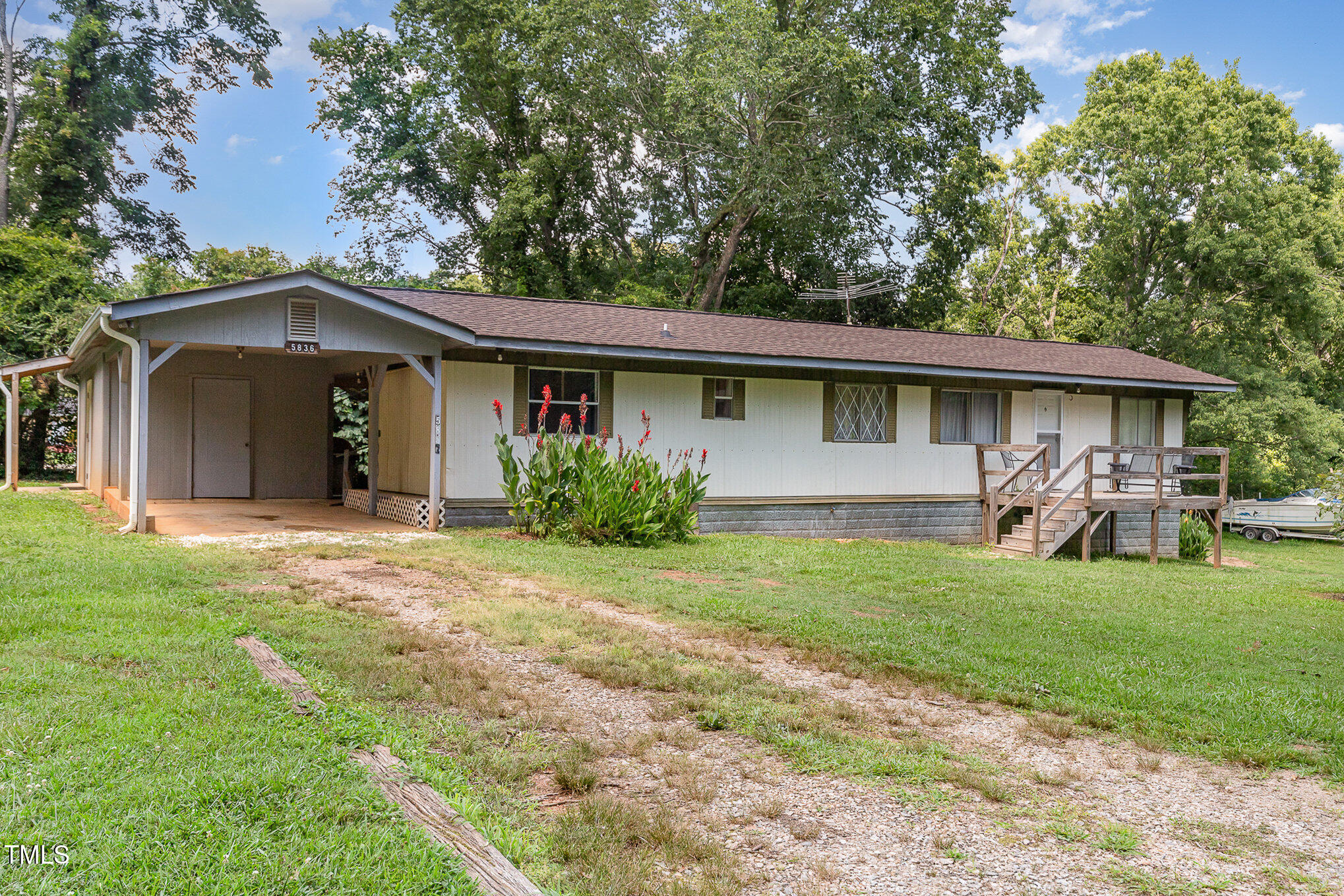5840 Fayetteville Road Raleigh, NC 27603 - Photo 26 of 40 a view of a back yard of the house