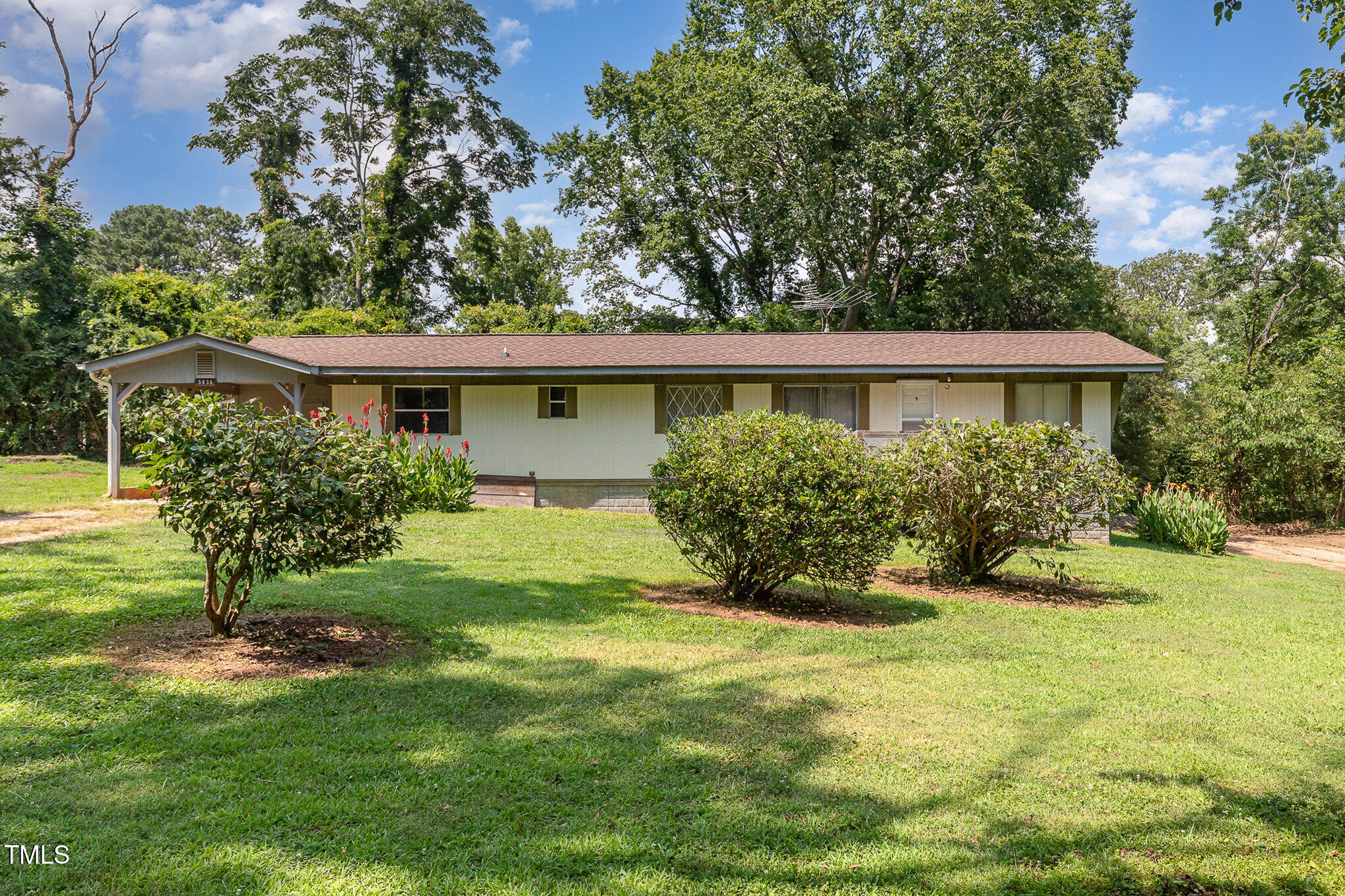 5840 Fayetteville Road Raleigh, NC 27603 - Photo 27 of 40 a view of a house with a yard and plants