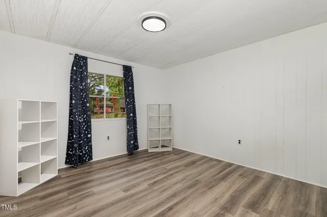 an empty room with closet