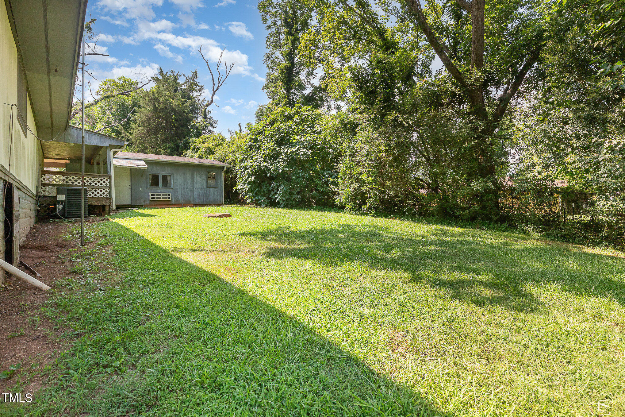 5840 Fayetteville Road Raleigh, NC 27603 - Photo 36 of 40 a swimming pool with trees in the background