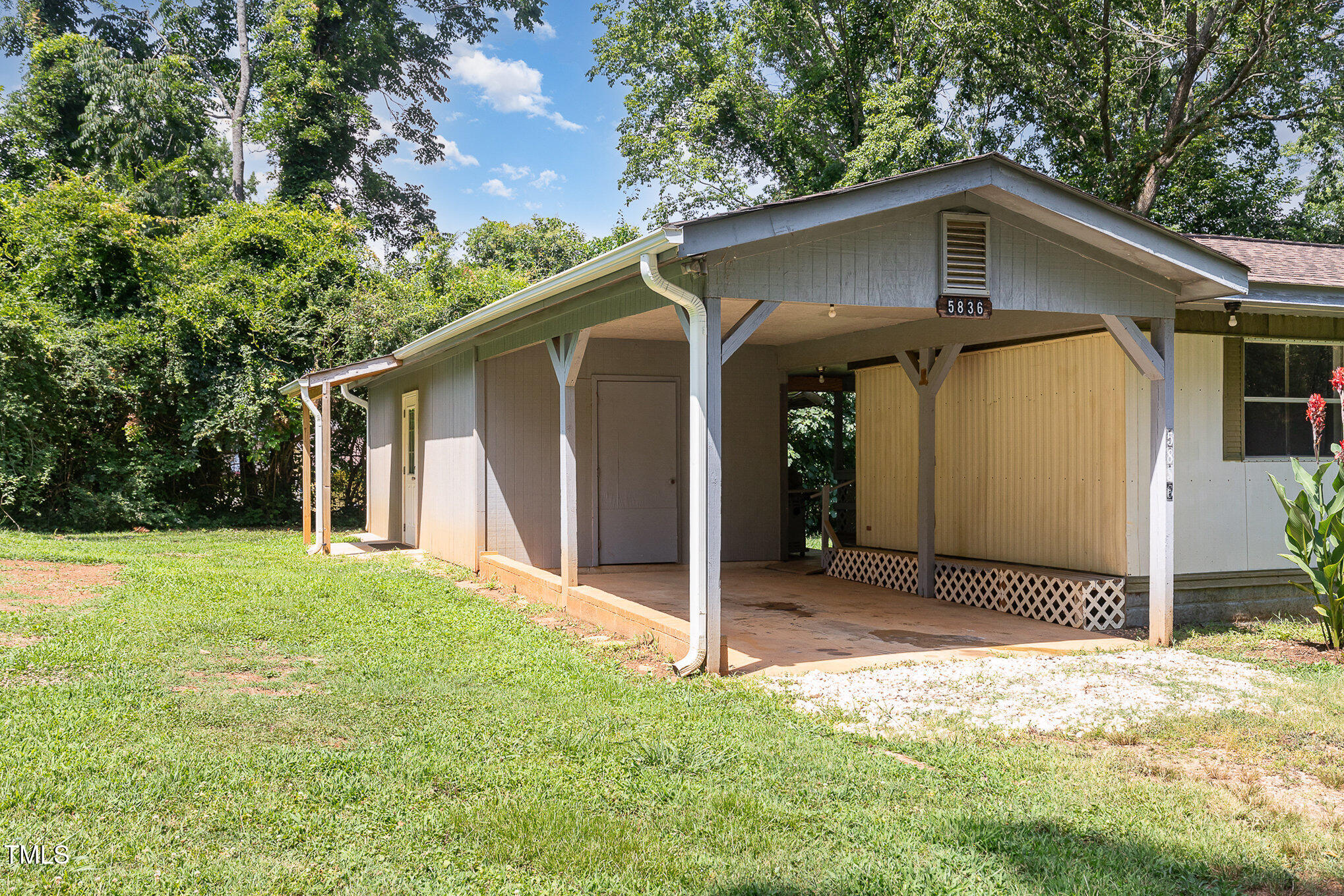 5840 Fayetteville Road Raleigh, NC 27603 - Photo 37 of 40 a front view of a house with a yard