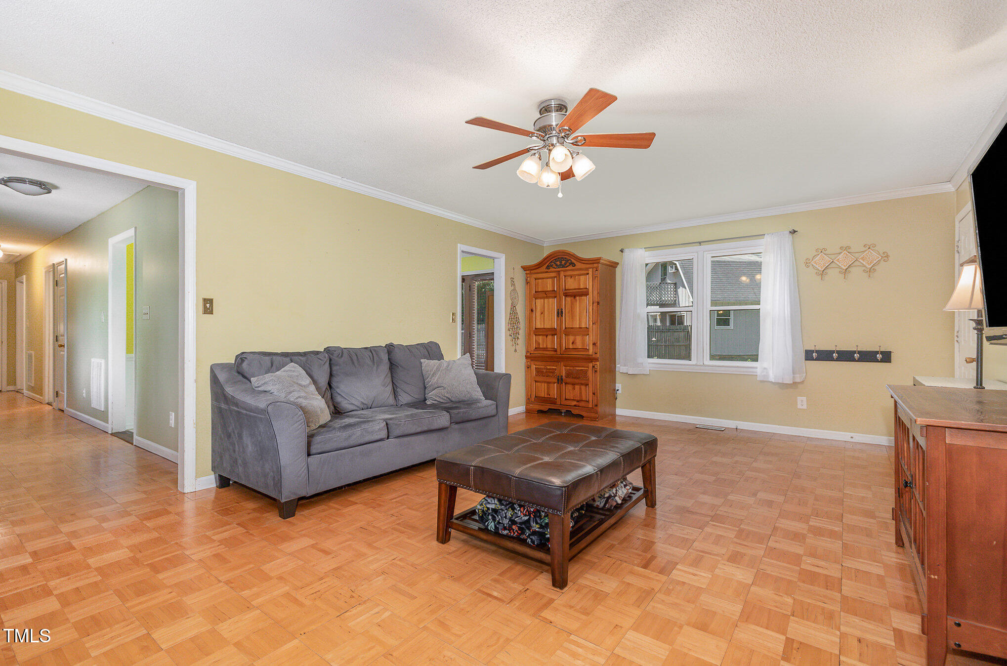 5840 Fayetteville Road Raleigh, NC 27603 - Photo 5 of 40 a living room with furniture and a window