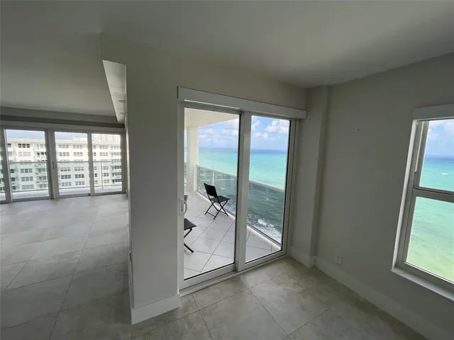 a kitchen with granite countertop a sink and a counter top space
