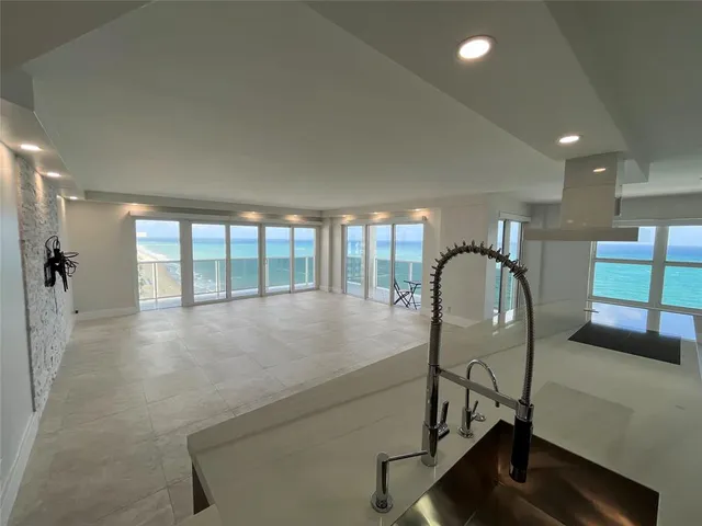 a bedroom with a bed and a view of bathroom