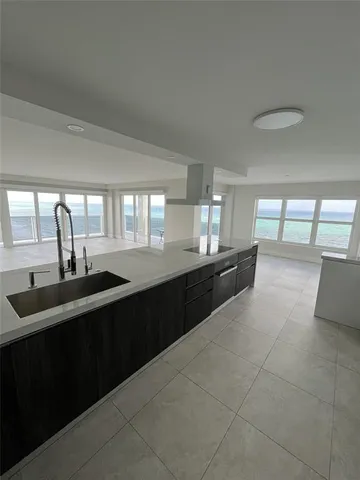 a bathroom with a shower and toilet