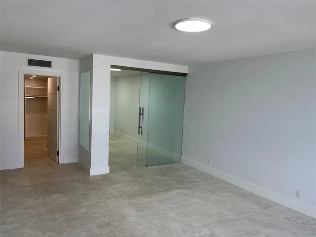 a brick building with a street sign