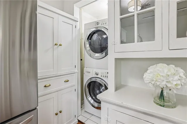 a close view of a utility room with dryer and washer