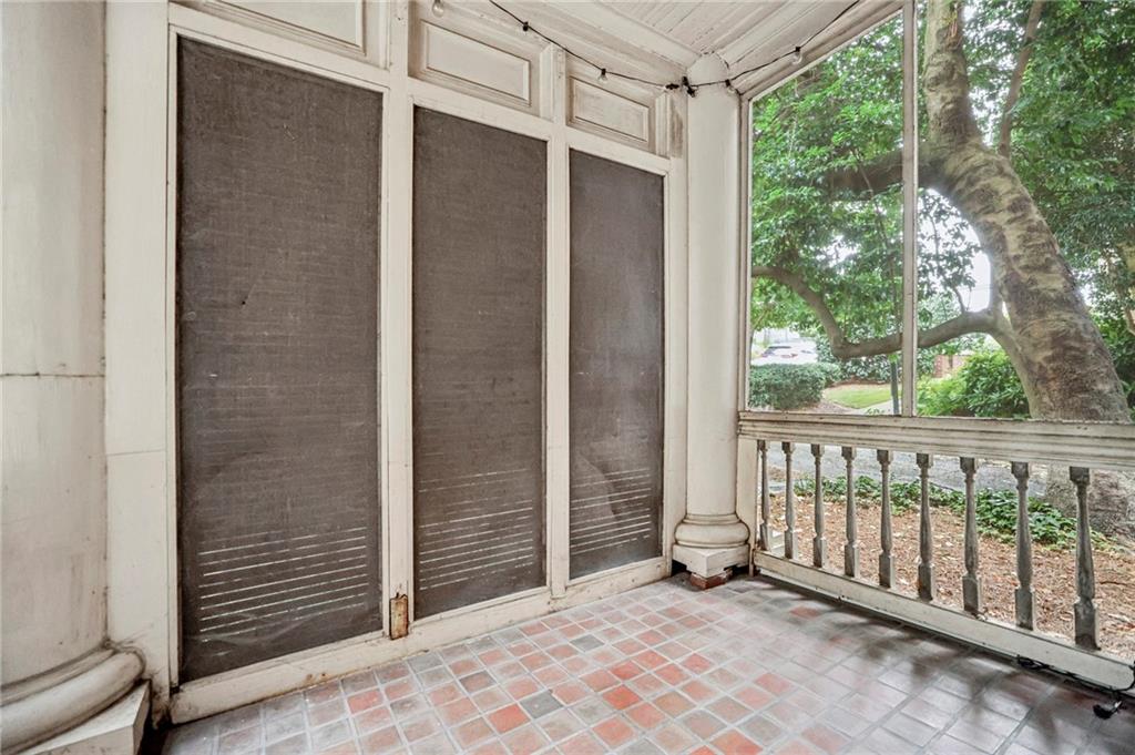 8 Collier Road Northwest, Unit A1 Atlanta, GA 30309 - Photo 16 of 31 a view of a porch with a door