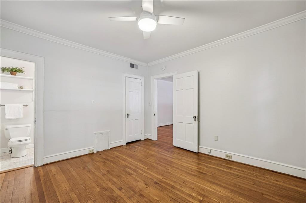 8 Collier Road Northwest, Unit A1 Atlanta, GA 30309 - Photo 24 of 31 wooden floor in an empty room