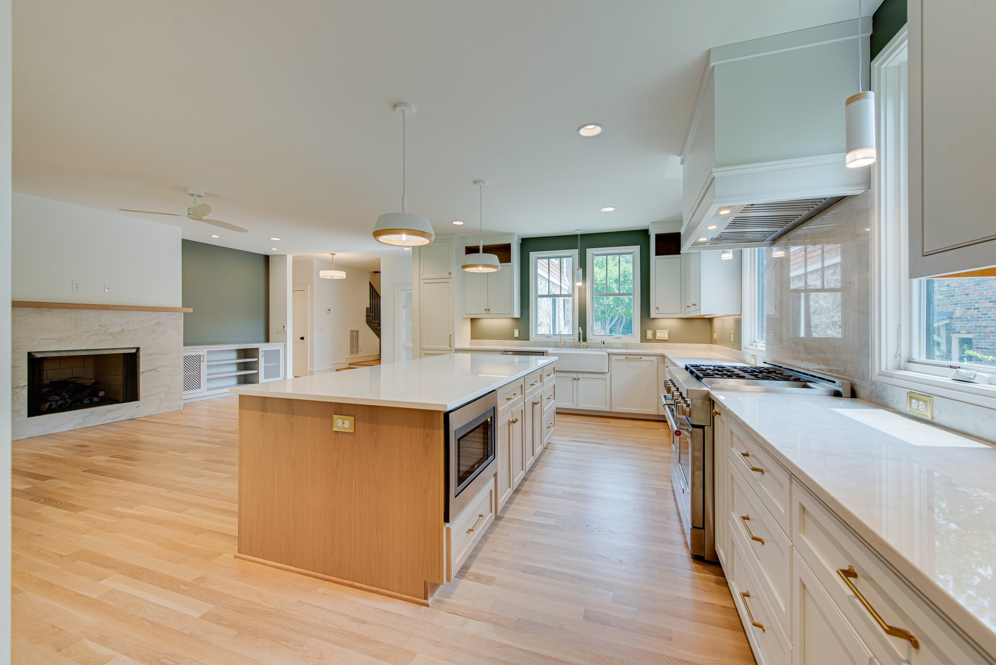 2111 Natchez Trace Nashville, TN 37212 - Photo 11 of 41 a large kitchen with stainless steel appliances a sink and a stove