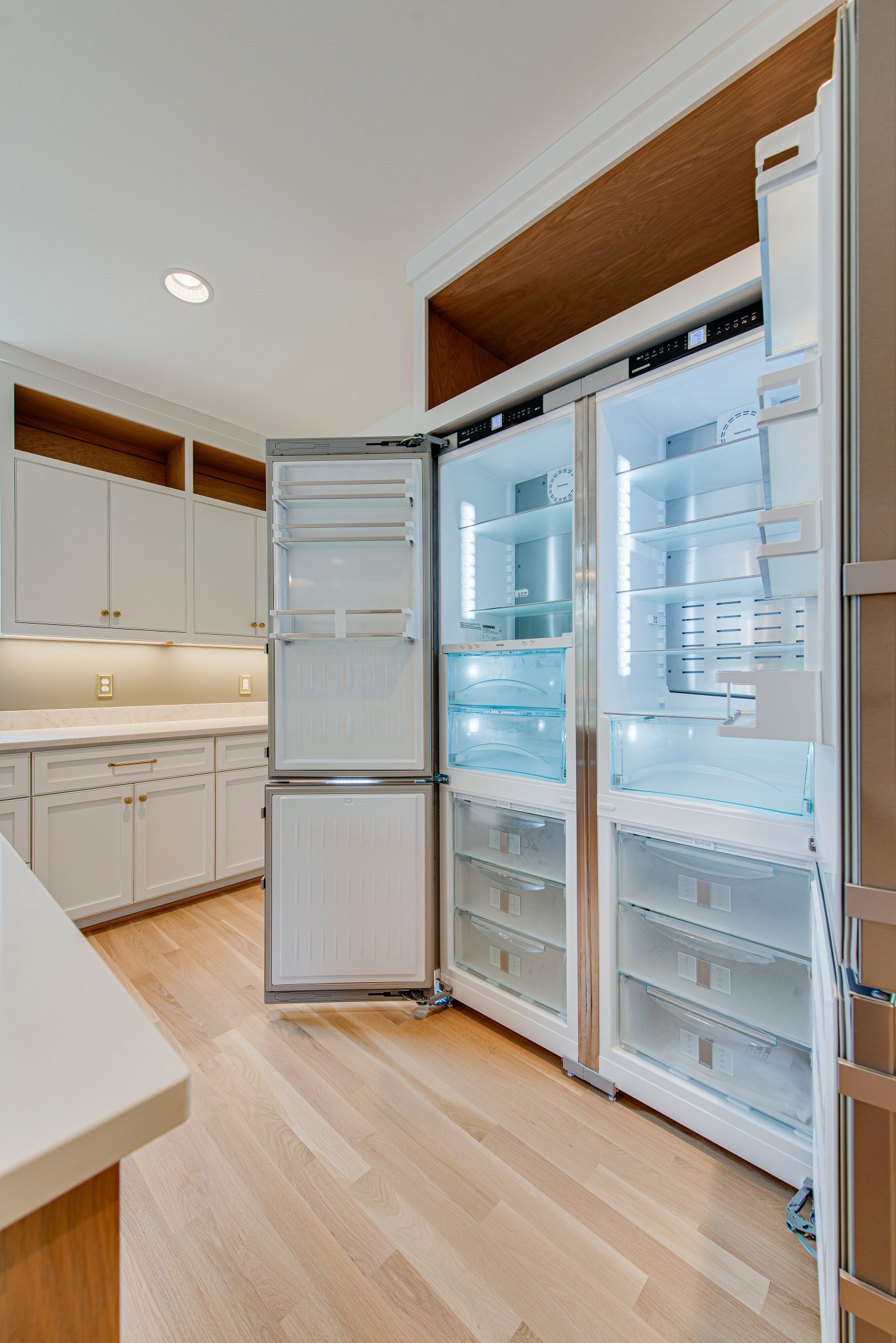 2111 Natchez Trace Nashville, TN 37212 - Photo 13 of 41 a view of a kitchen with a sink and refrigerator