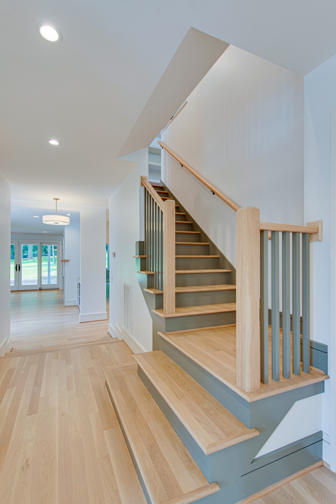 2111 Natchez Trace Nashville, TN 37212 - Photo 21 of 41 a view of a house with stairs and a floor to ceiling window