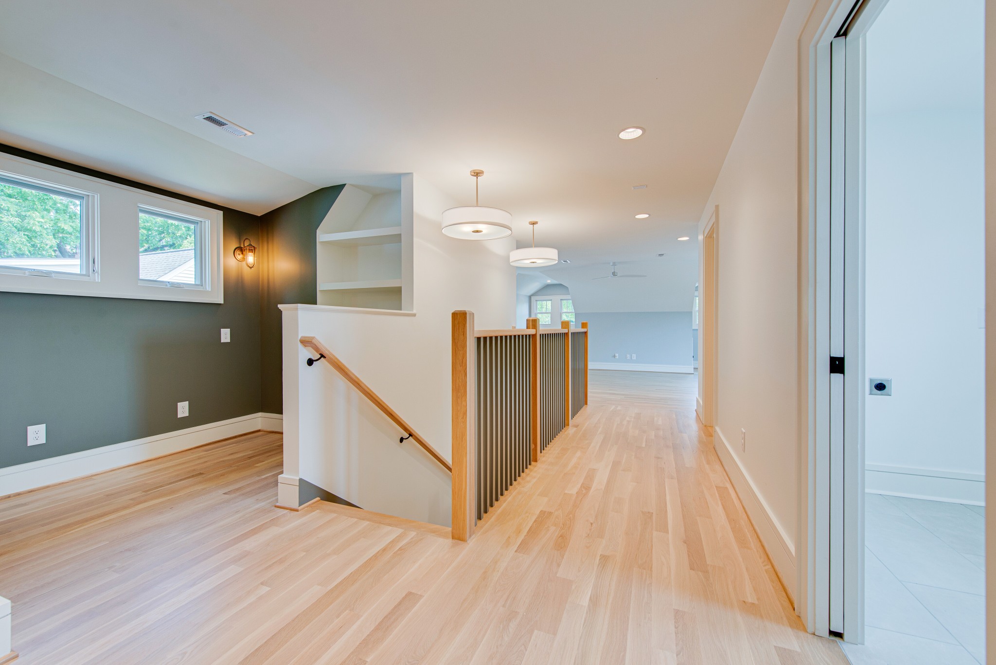2111 Natchez Trace Nashville, TN 37212 - Photo 22 of 41 a view of a hallway with wooden floor