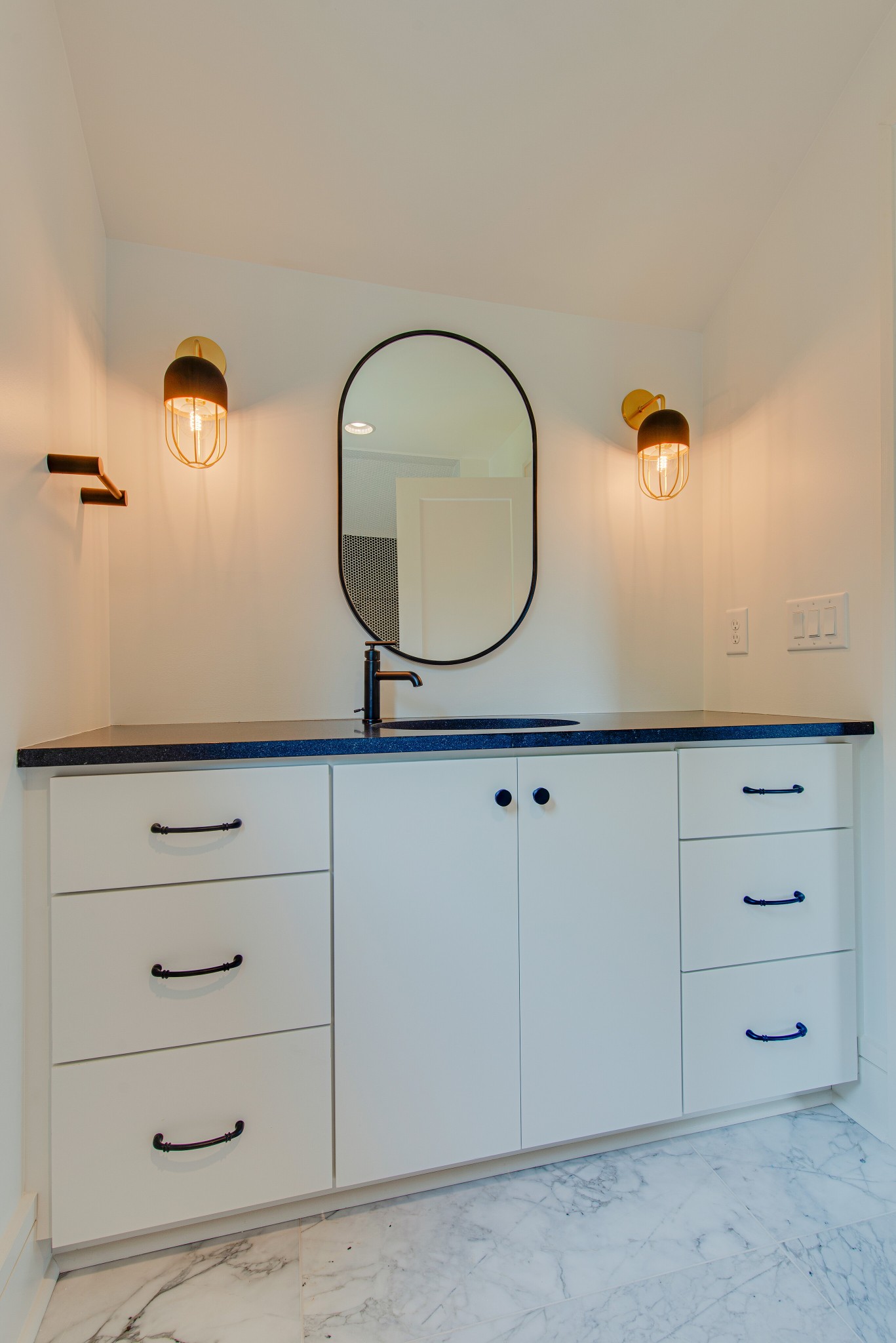 2111 Natchez Trace Nashville, TN 37212 - Photo 25 of 41 a bathroom with a mirror and vanity