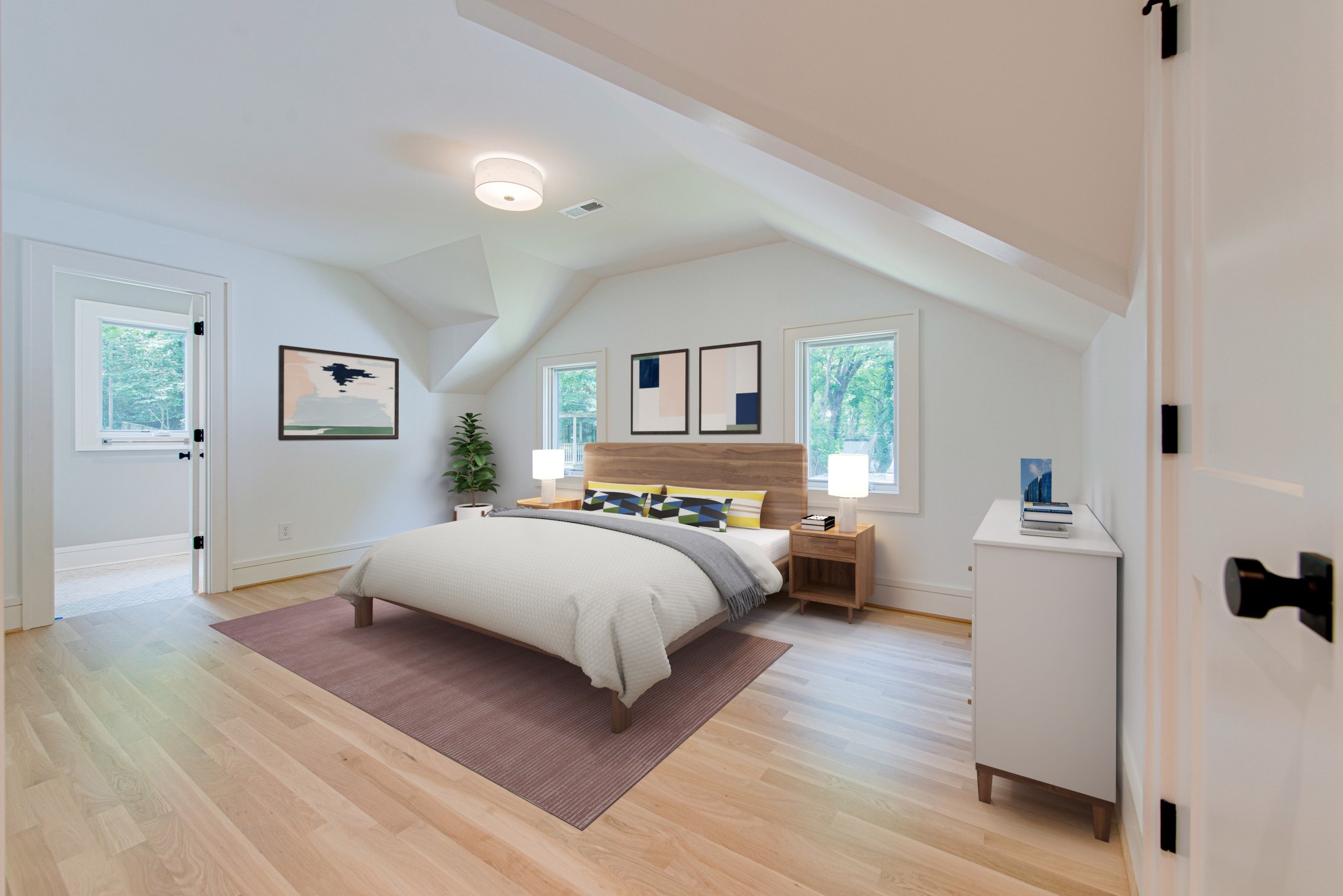 2111 Natchez Trace Nashville, TN 37212 - Photo 27 of 41 a bedroom with a large bed and a wooden floor