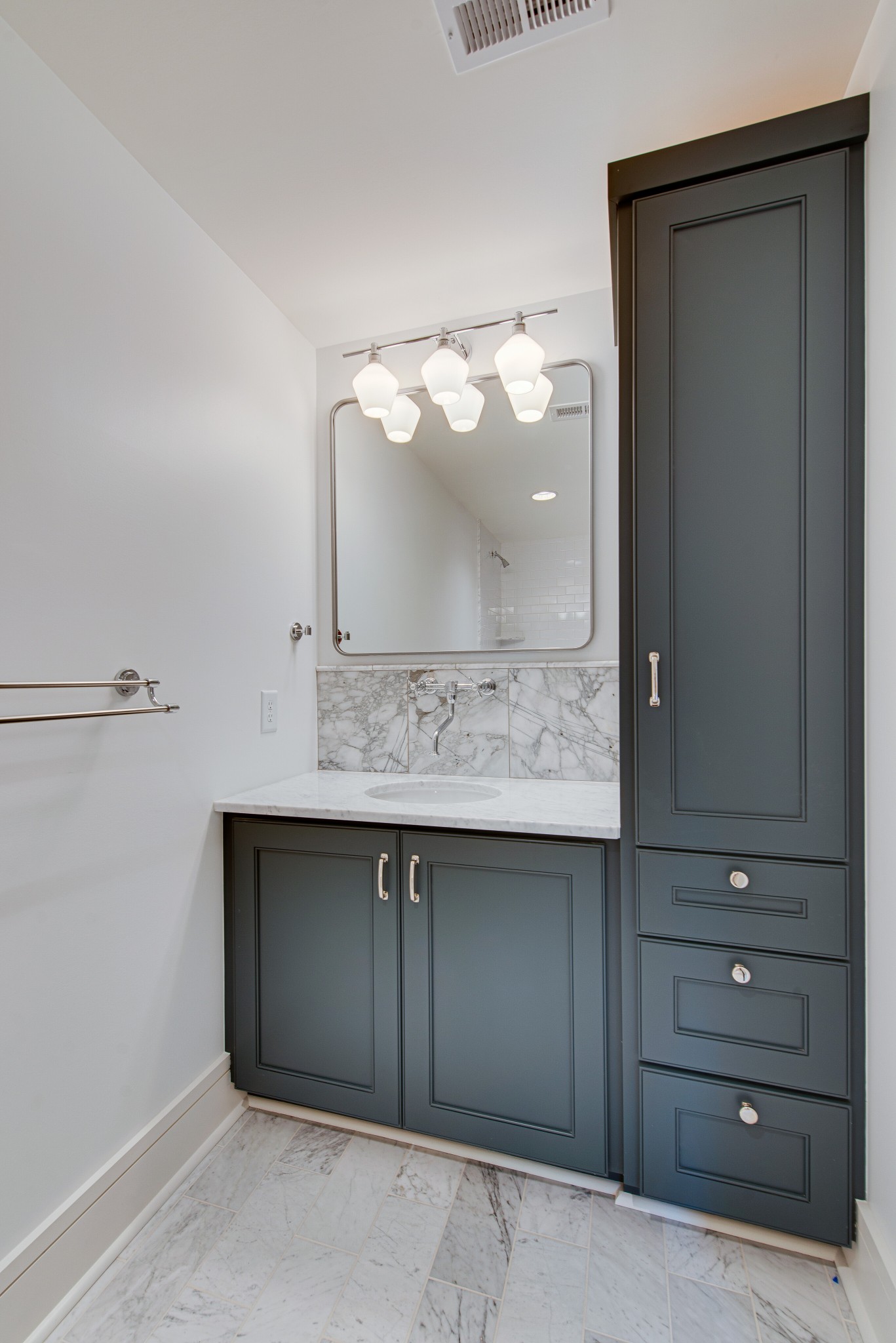2111 Natchez Trace Nashville, TN 37212 - Photo 29 of 41 a bathroom with a sink and a mirror