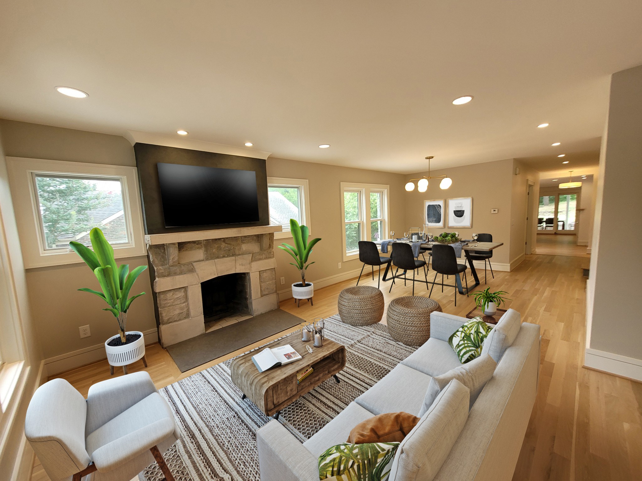 2111 Natchez Trace Nashville, TN 37212 - Photo 3 of 41 a living room with furniture a fireplace and a flat screen tv